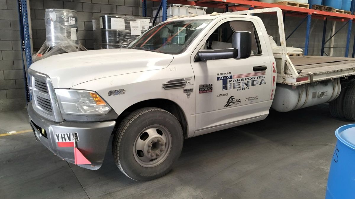 Camioneta de plataforma AutoTransportes Tienda